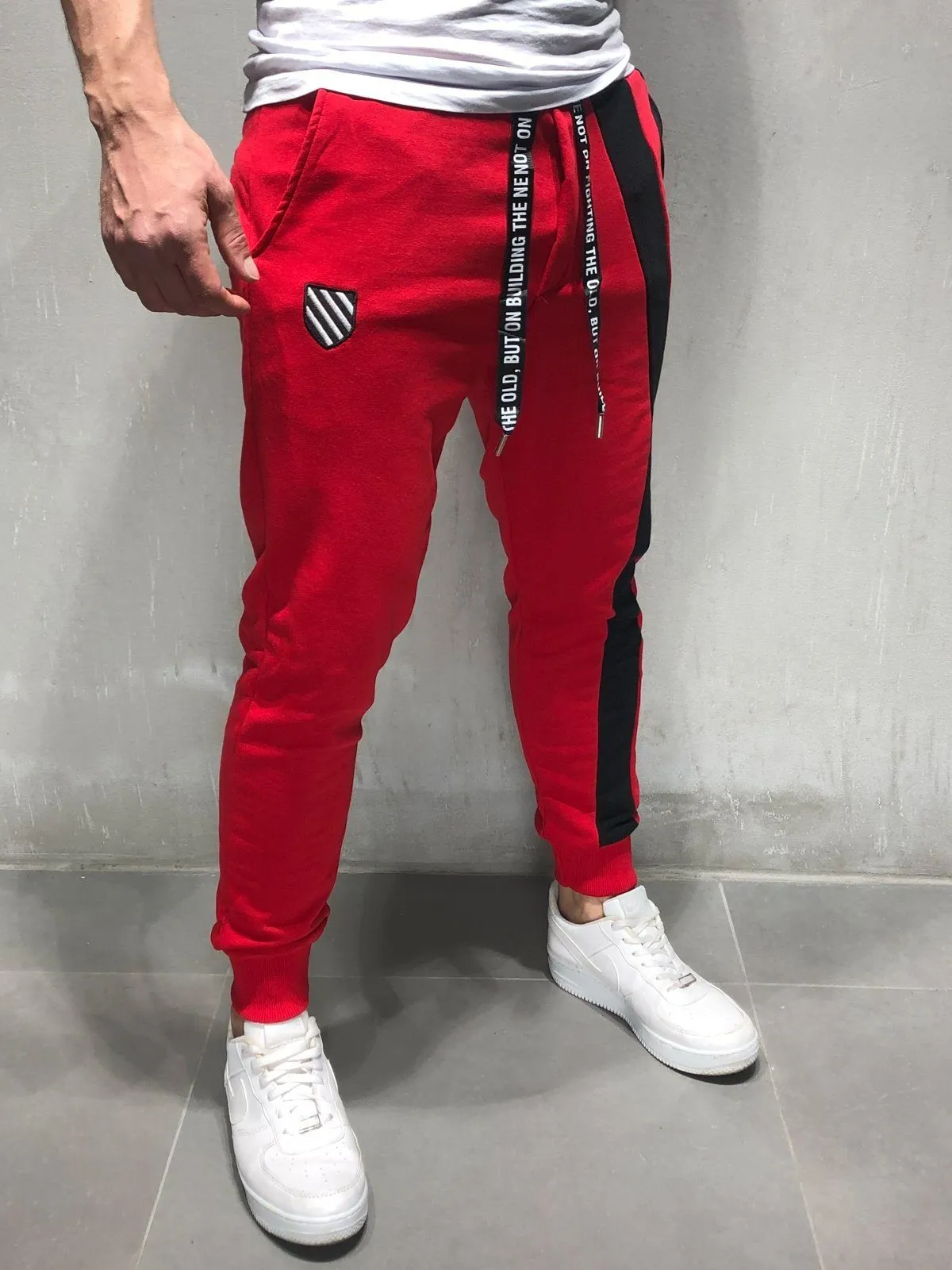 Red Sweatpants Black Stripe Details